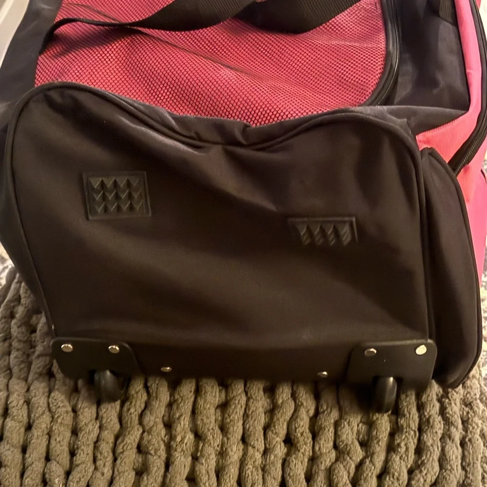 Pink and Black Garment Bag with Wheels 30” long• 16” wide• 14” high